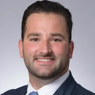 Dr. Dayron Baez, DMD, of Signature Dental Group.