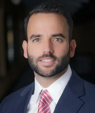 Dr. Joel Baez, DMD, DICOI, of Signature Dental Group.