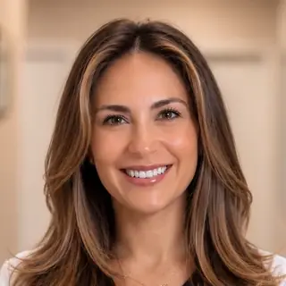 Dr. Yesenia Fernandez Baez, DMD, FICOI, of Signature Dental Group.